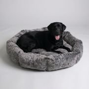 Large Dog sitting on Fur Bolster Dog Bed