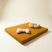chew toys on orthopedic dog bed