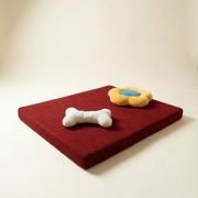 chew toys on orthopedic dog bed