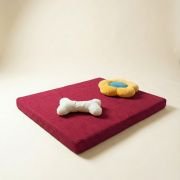 chew toys on orthopedic dog bed