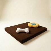 chew toys on orthopedic dog bed